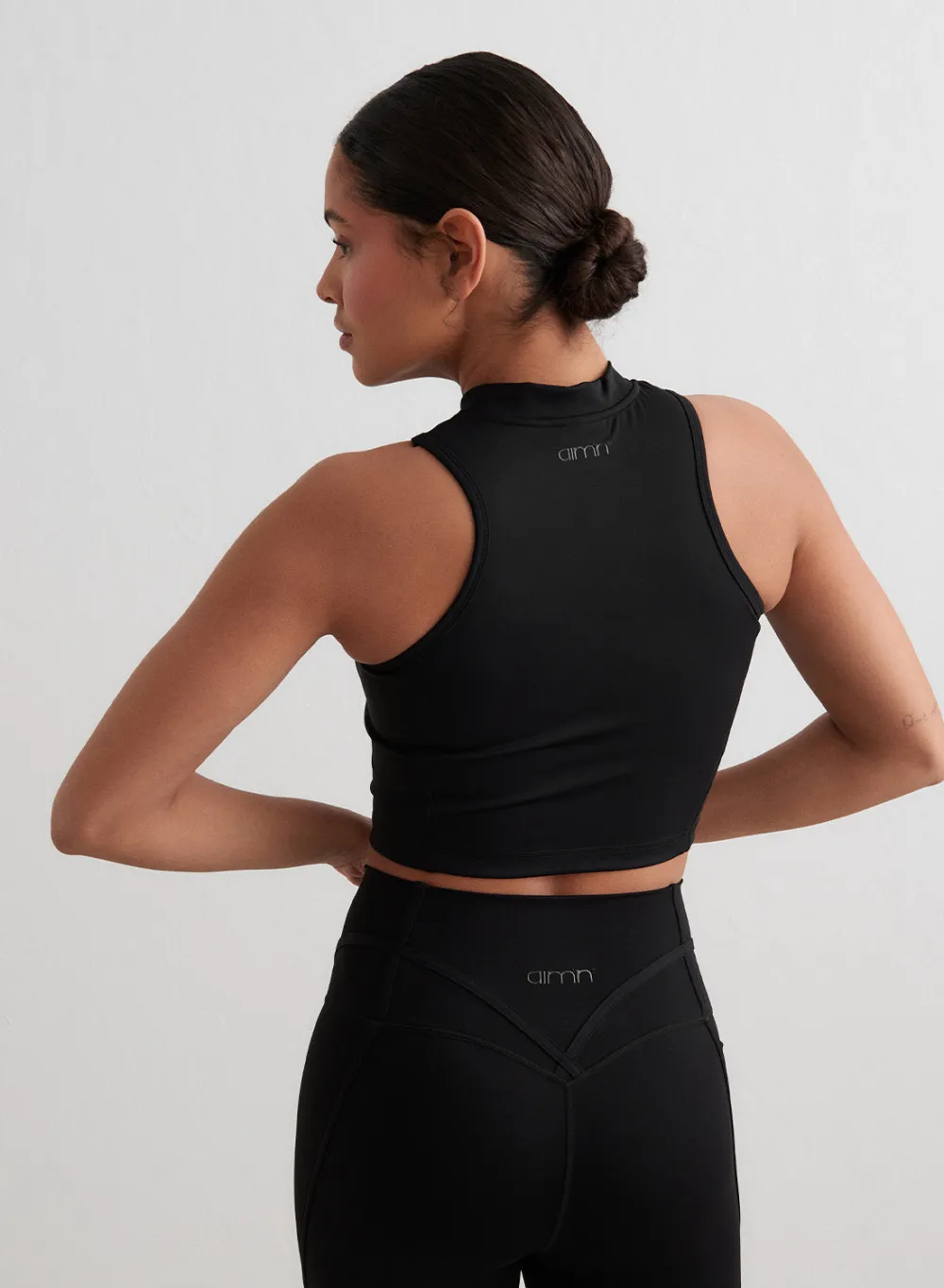 AIM’N Black Sculpting Racer Front Zip Top